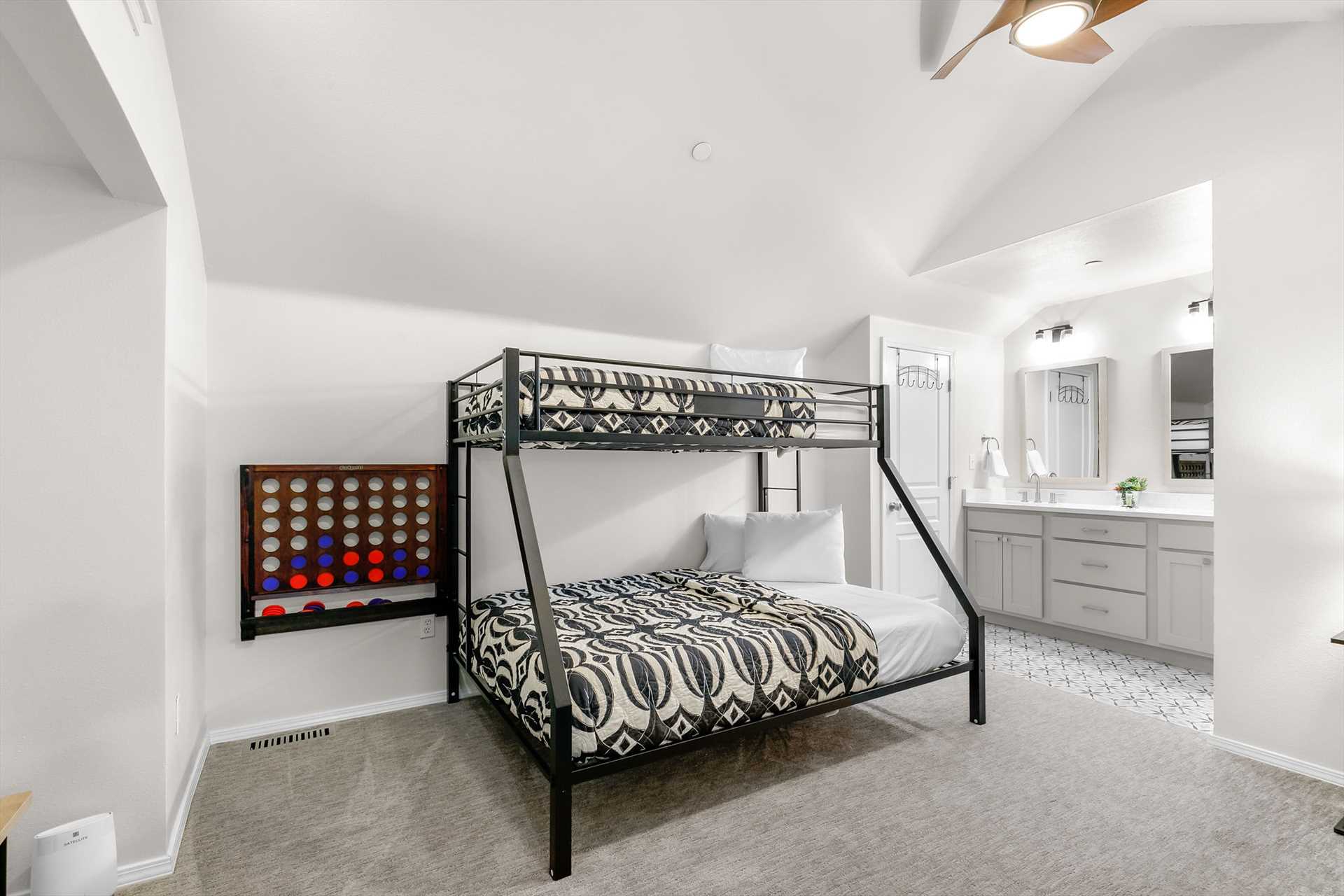 Upstairs is a large bunk room, perfect for kids! There are a