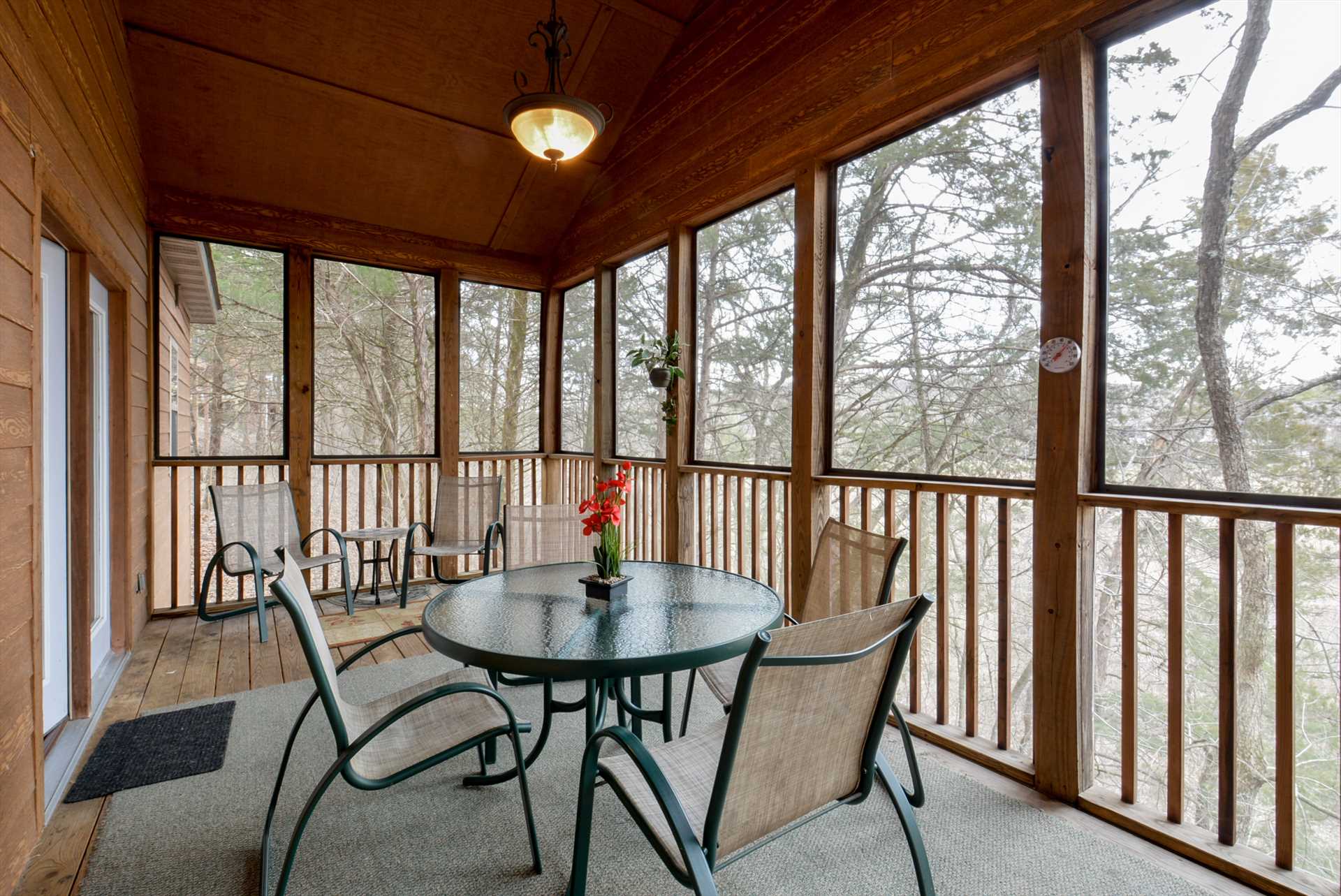 The porch is a favorite spot at this property, Lodge #24.