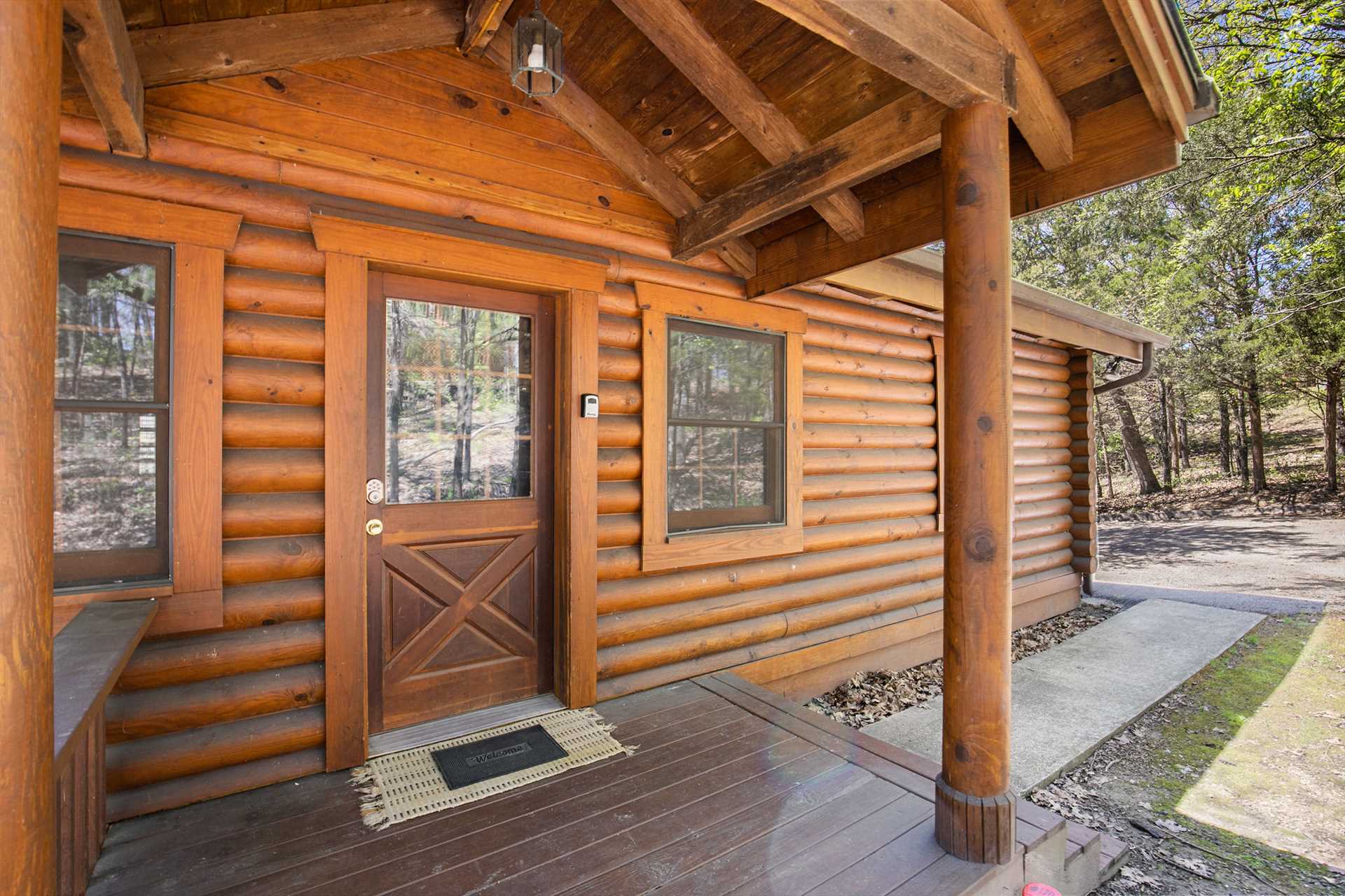 This Branson Woods cabin features authentic log construction