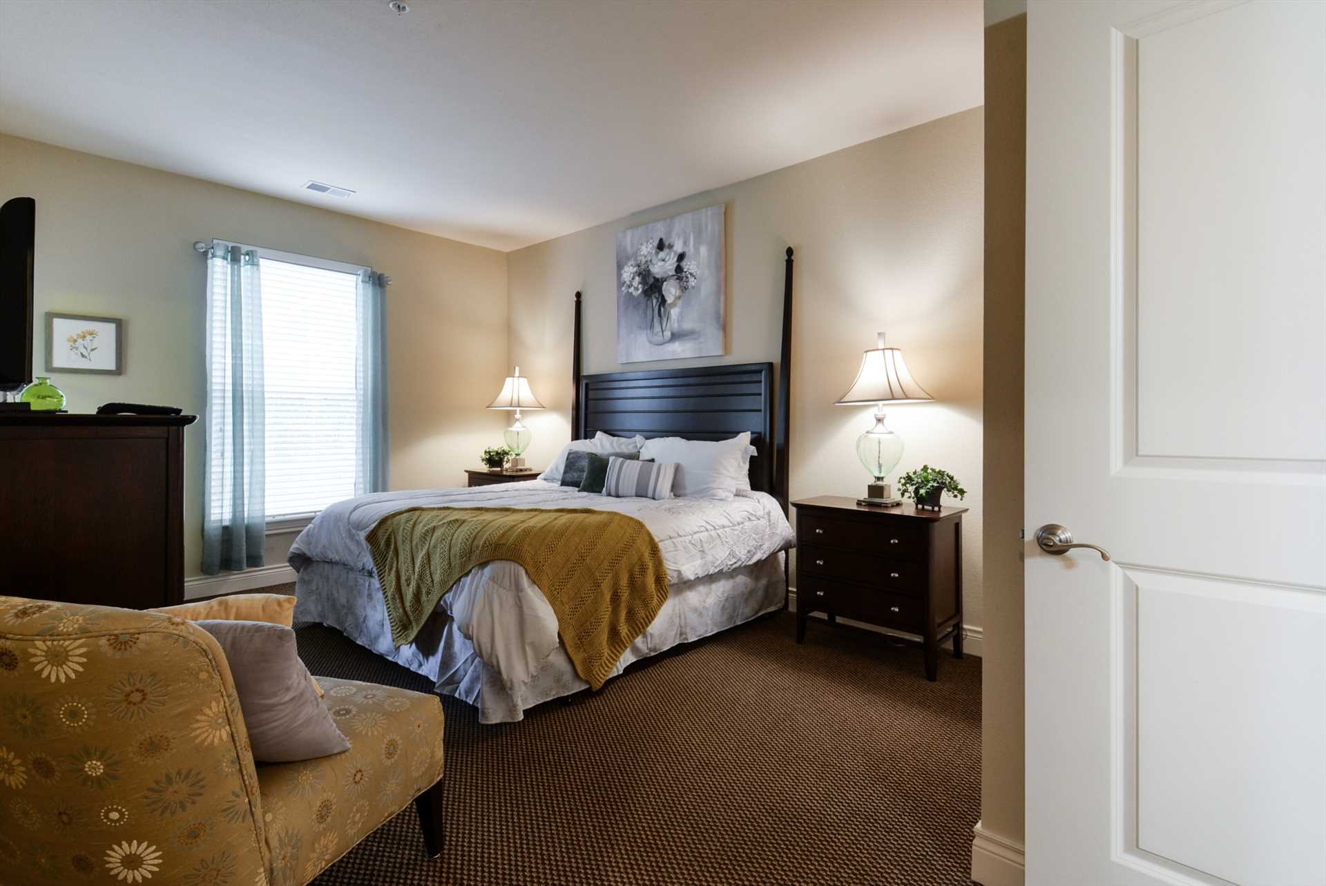 Both spacious bedrooms include flat screen televisions.