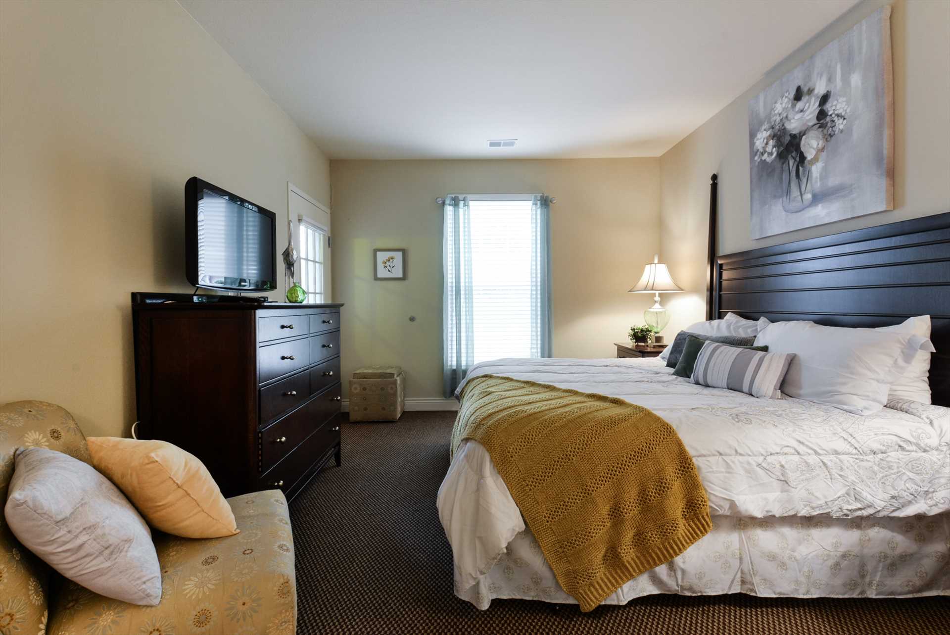 Both beds in the condo are fitted with luxury linens.