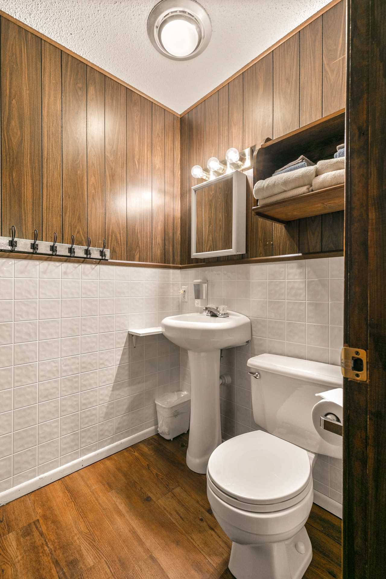 The bathroom is located off the living area. (Cabin 10)