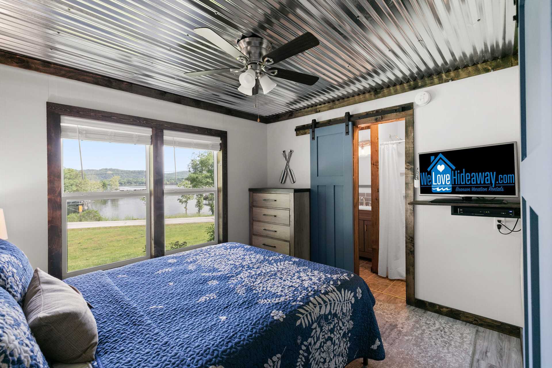 This bedroom has an on suit private bathroom and flat screen