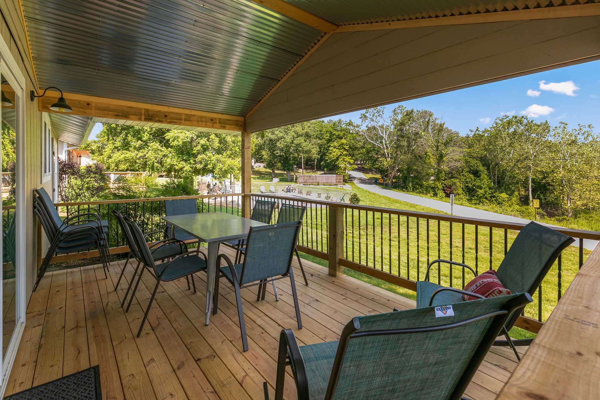 The large covered deck is just off the living room. The wate