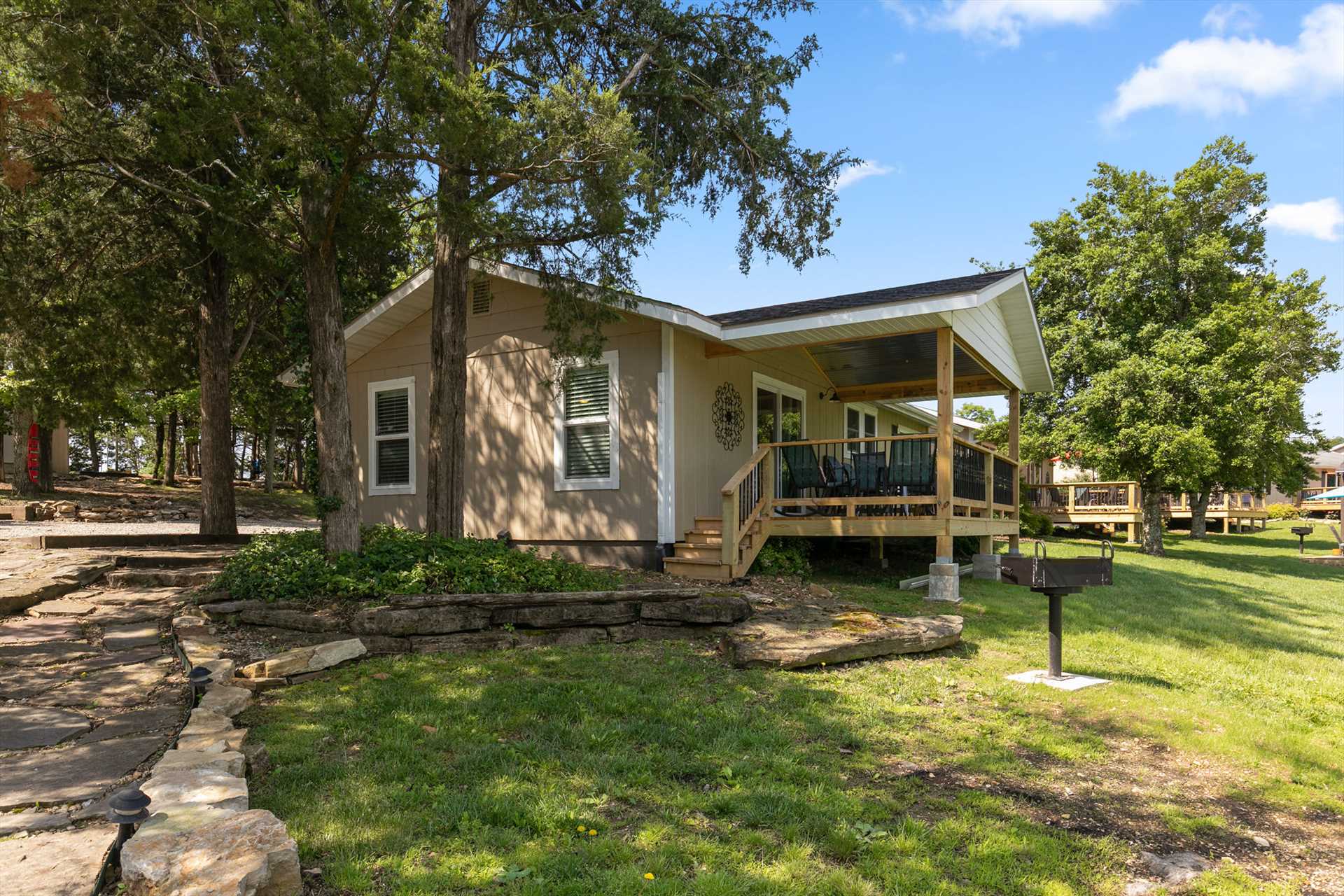 This cabin is just steps away from the resort pool and dock.