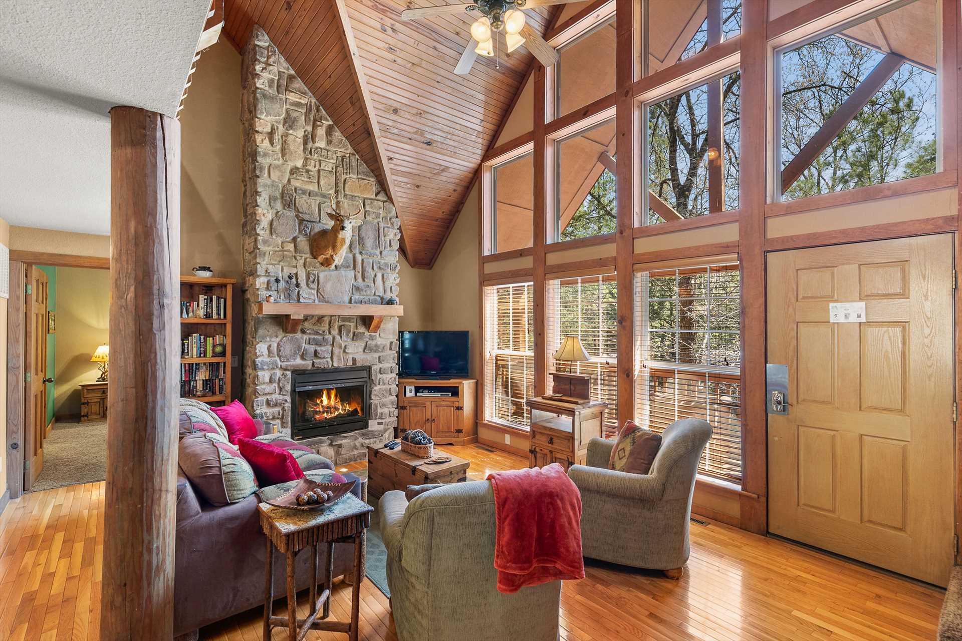 The stone fireplace provides the perfect cozy feeling in thi