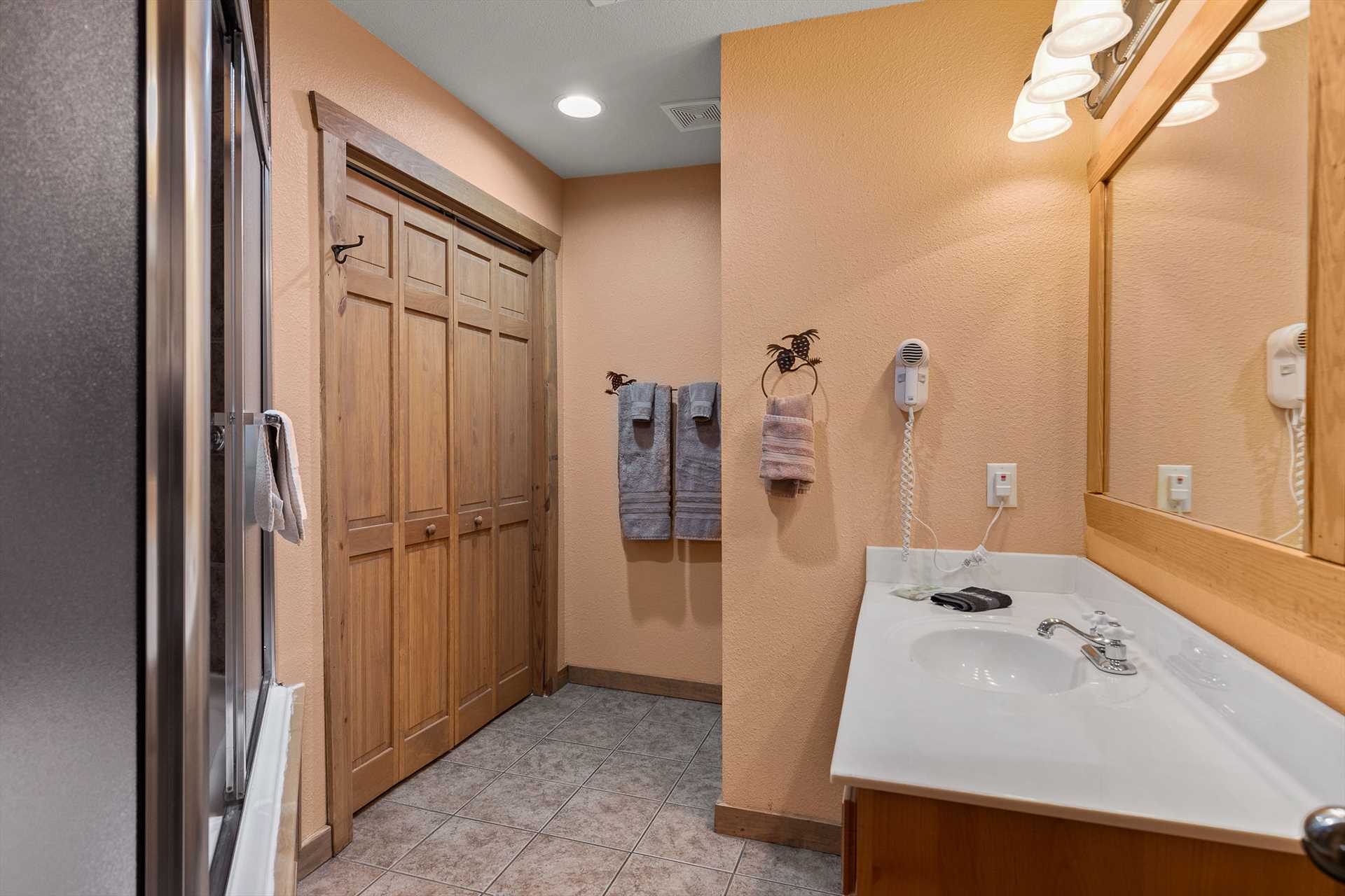 There is additional closet space in the bathroom as well.