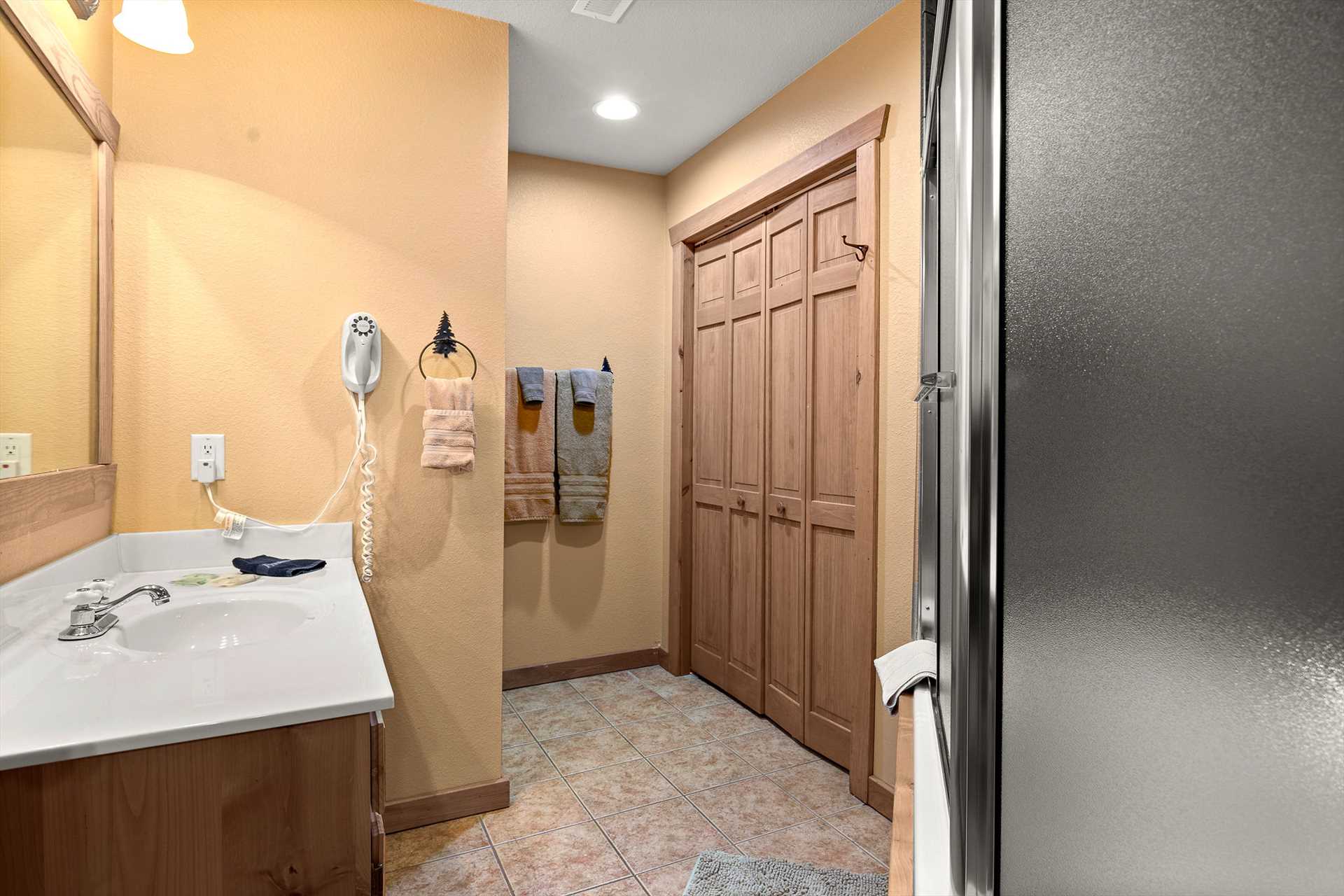 This private bathroom also includes a whirlpool tub/ shower 