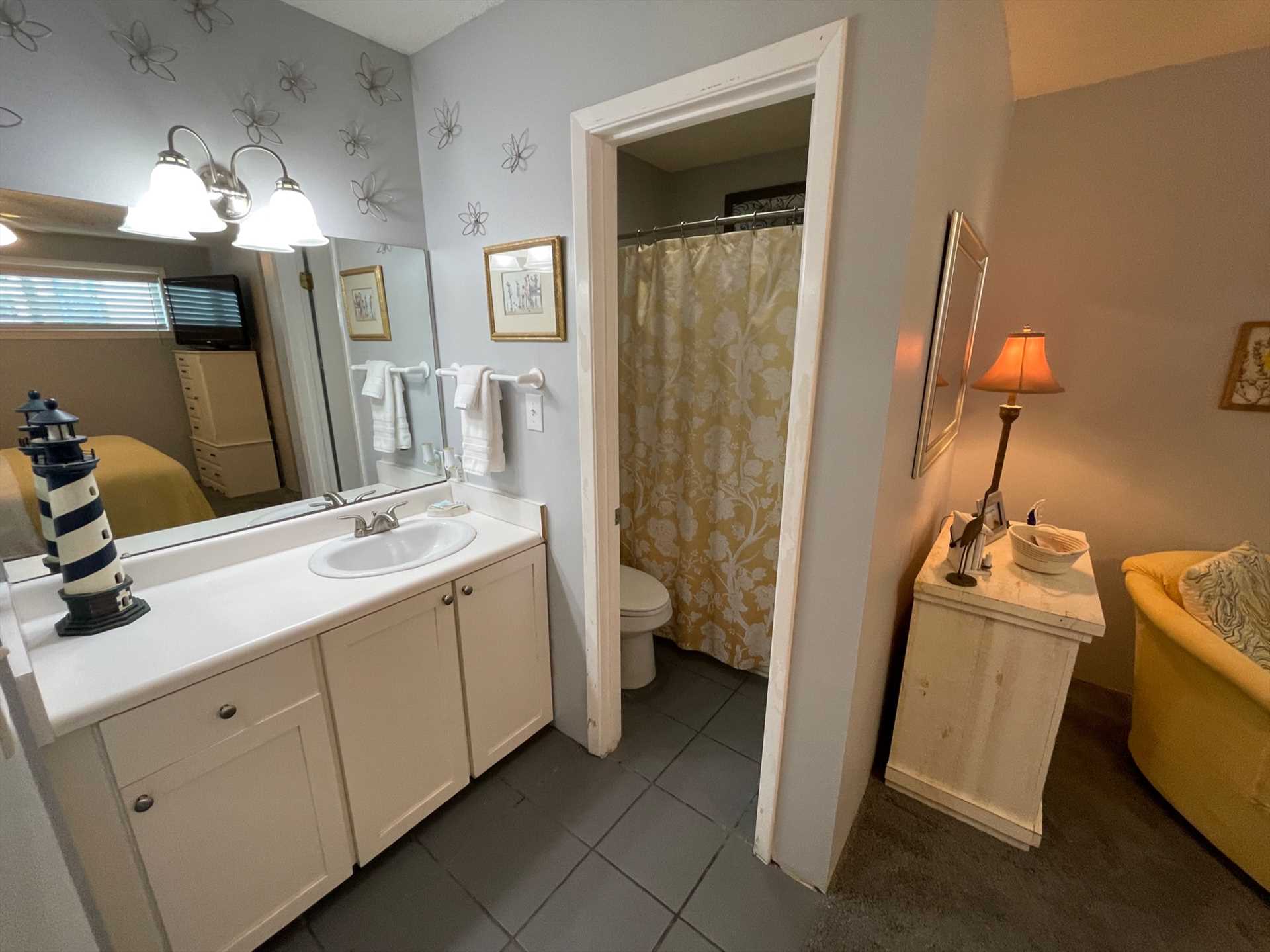 The bathroom provides plenty of space to get ready.