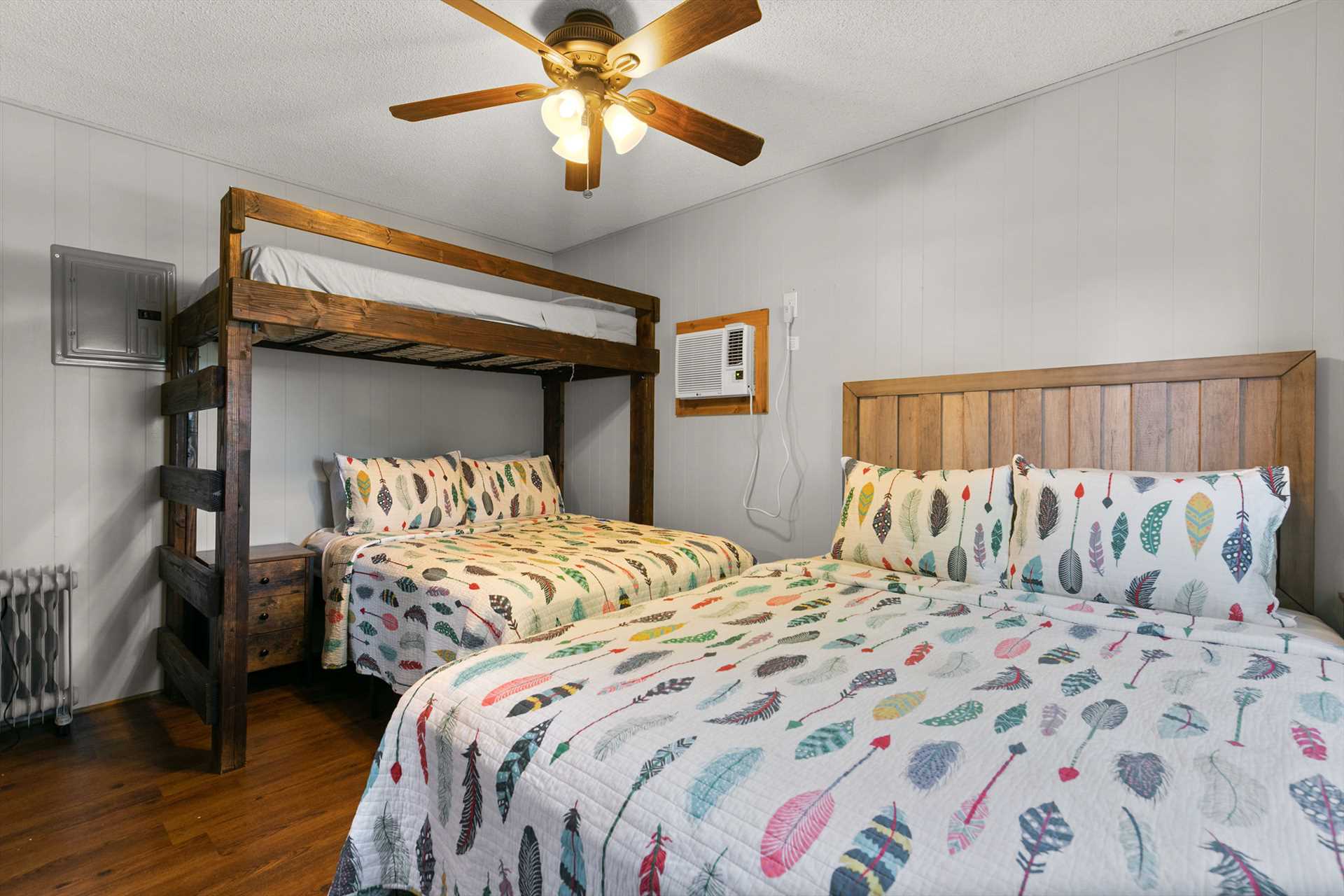 The first of two bedrooms is a bunk room.