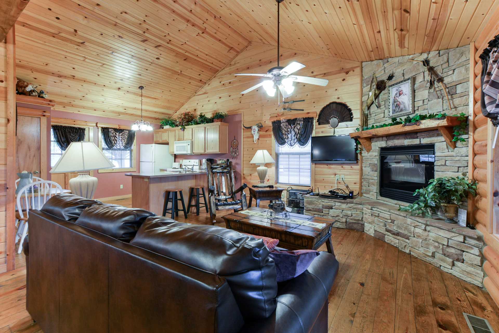 The living area includes a flat screen television!