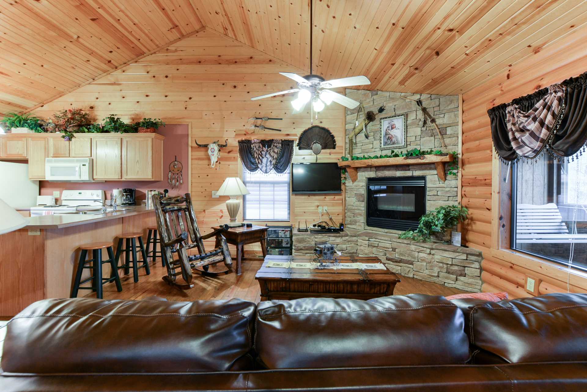 The kitchen overlooks the living area.