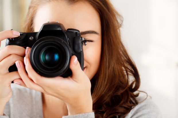 woman taking photo