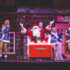 Santa and dancers on stage during a Branson Christmas show
