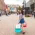 Woman carrying shopping bags on the streets of Branson Landing