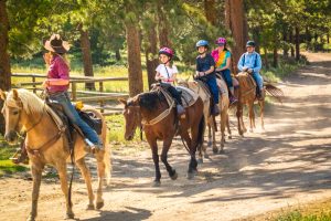 Photo of a Group of Young Horseback Riders. Horseback Riding is One of the Best Branson Outdoor Activities.