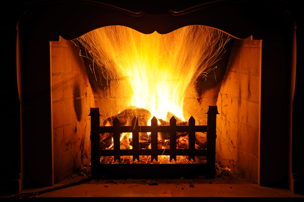 Fireplace with flames burning high