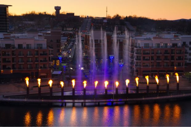 A wide shot of the Branson Landing Fountain Show.