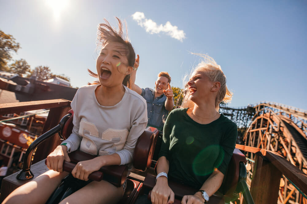 Photo of Two Young Women Riding a Roller Coaster During Spring Break in Branson.