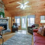 Branson vacation cabin living room with fireplace