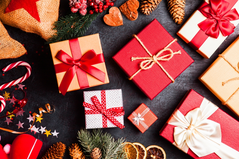 Christmas gift boxes, candy canes and pine cones.