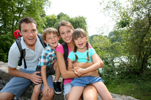 Happy family photo on a trail